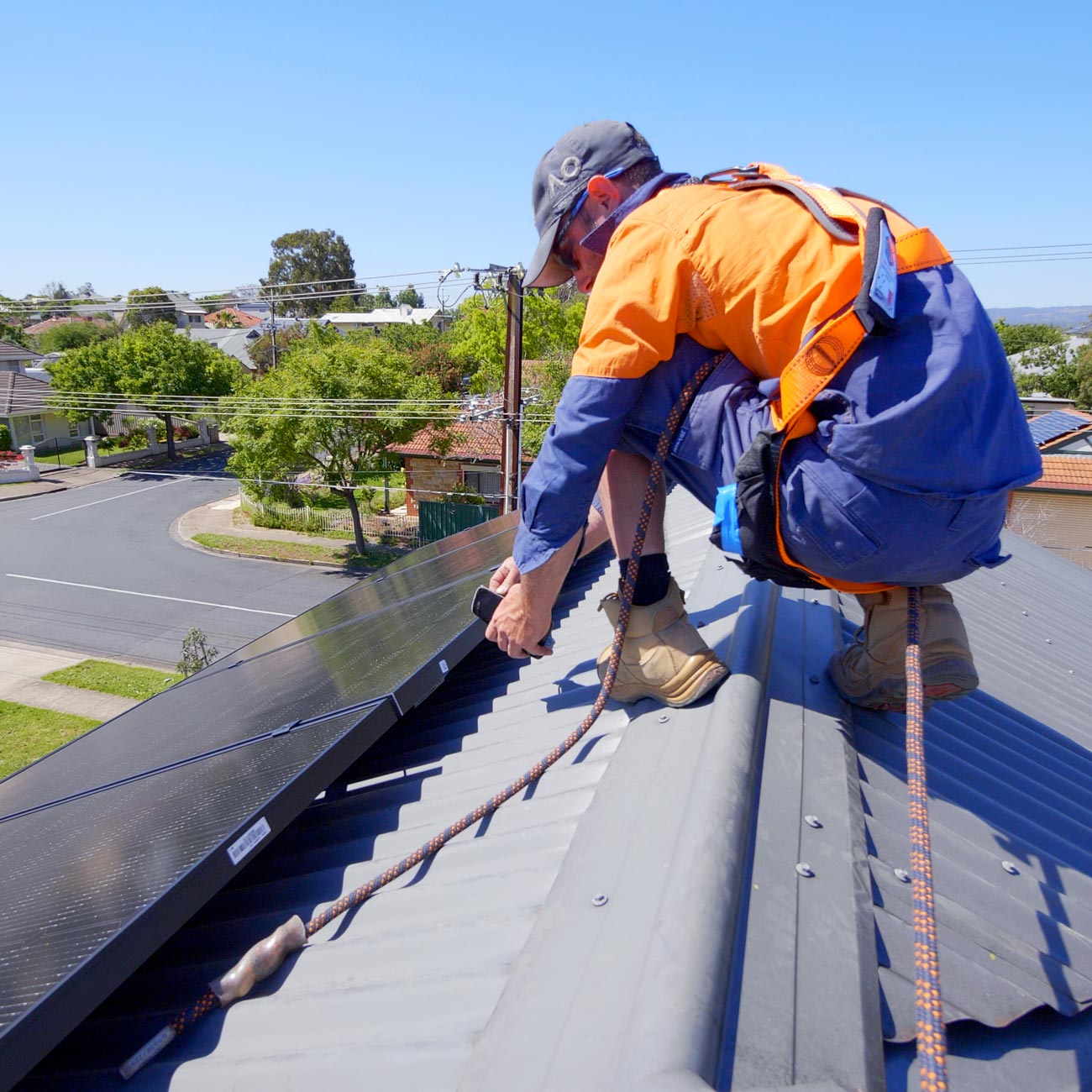 solar installer on roof in wanneroo